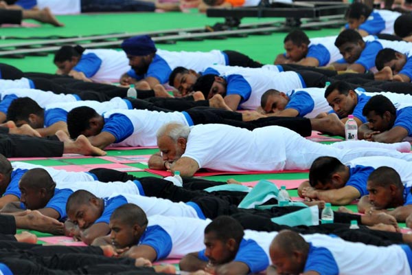 PM participates in yoga with top cops in Hyderabad